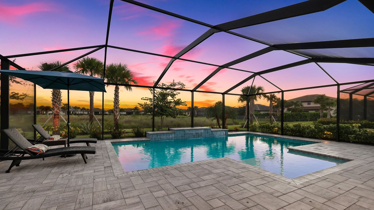 Custom Pool Home in The Place at Corkscrew in Estero, FL!