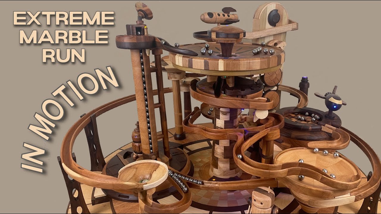 Retro Sci-Fi marble run with motorized lifts: most difficult woodworking project I've attempted!