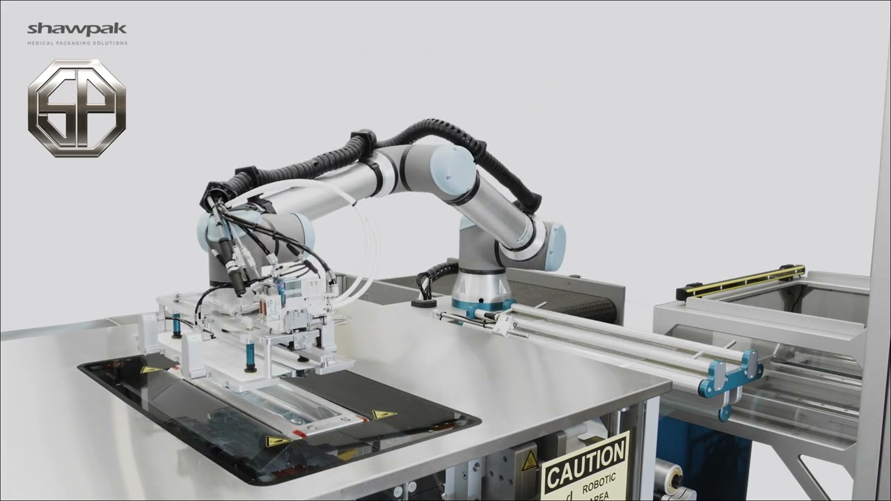 Shawpak Robotic Loading from Primary to Secondary Packaging System
