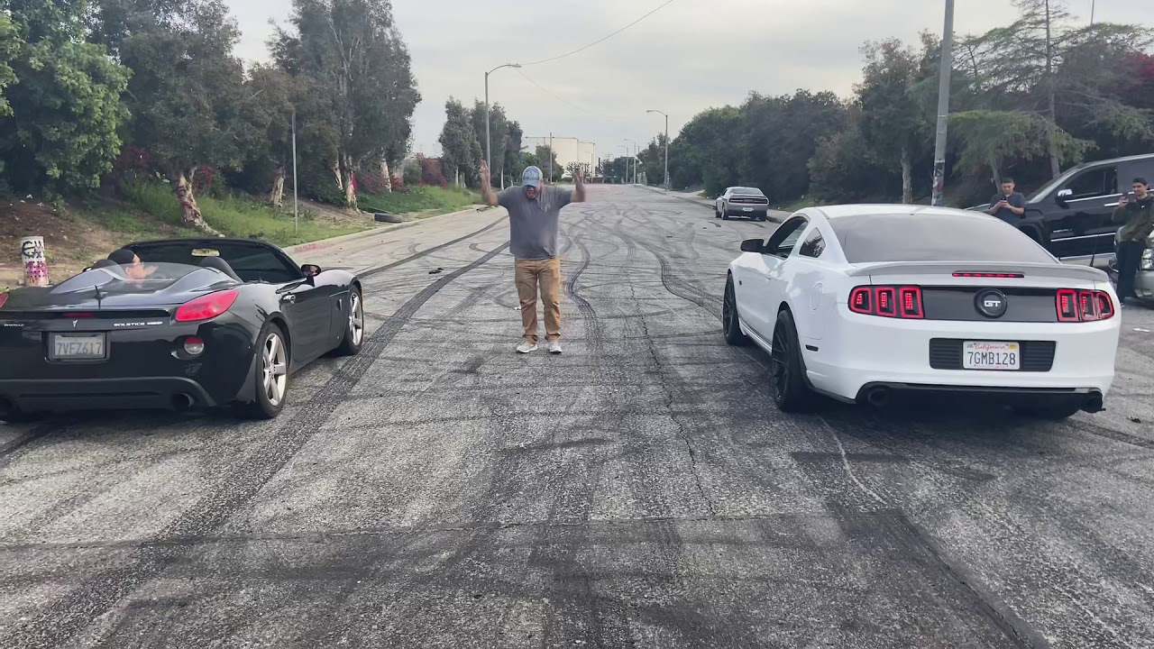 2014 mustang gt vs Pontiac Solstice Turbo