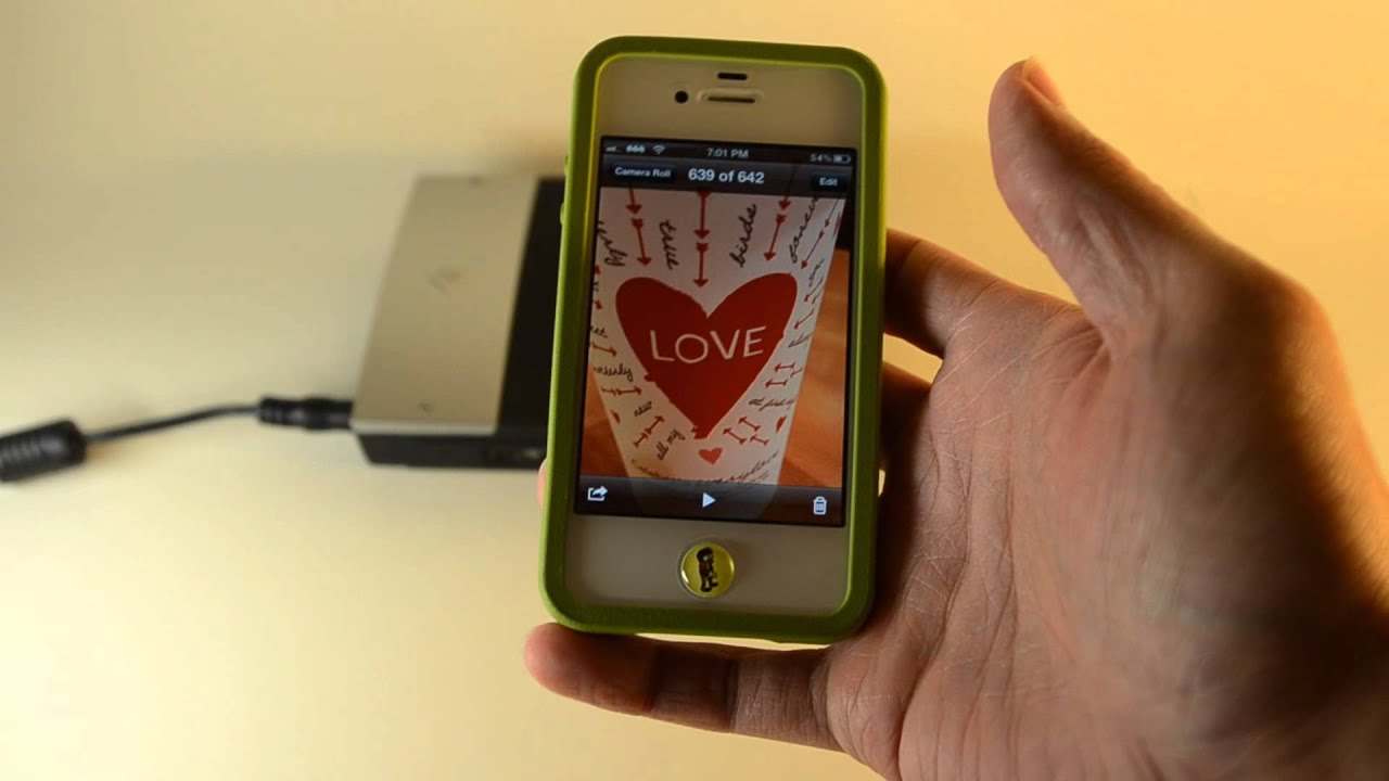 Printing from the iPhone 4S to Polaroid GL 10 / Pogo through Bluetooth.