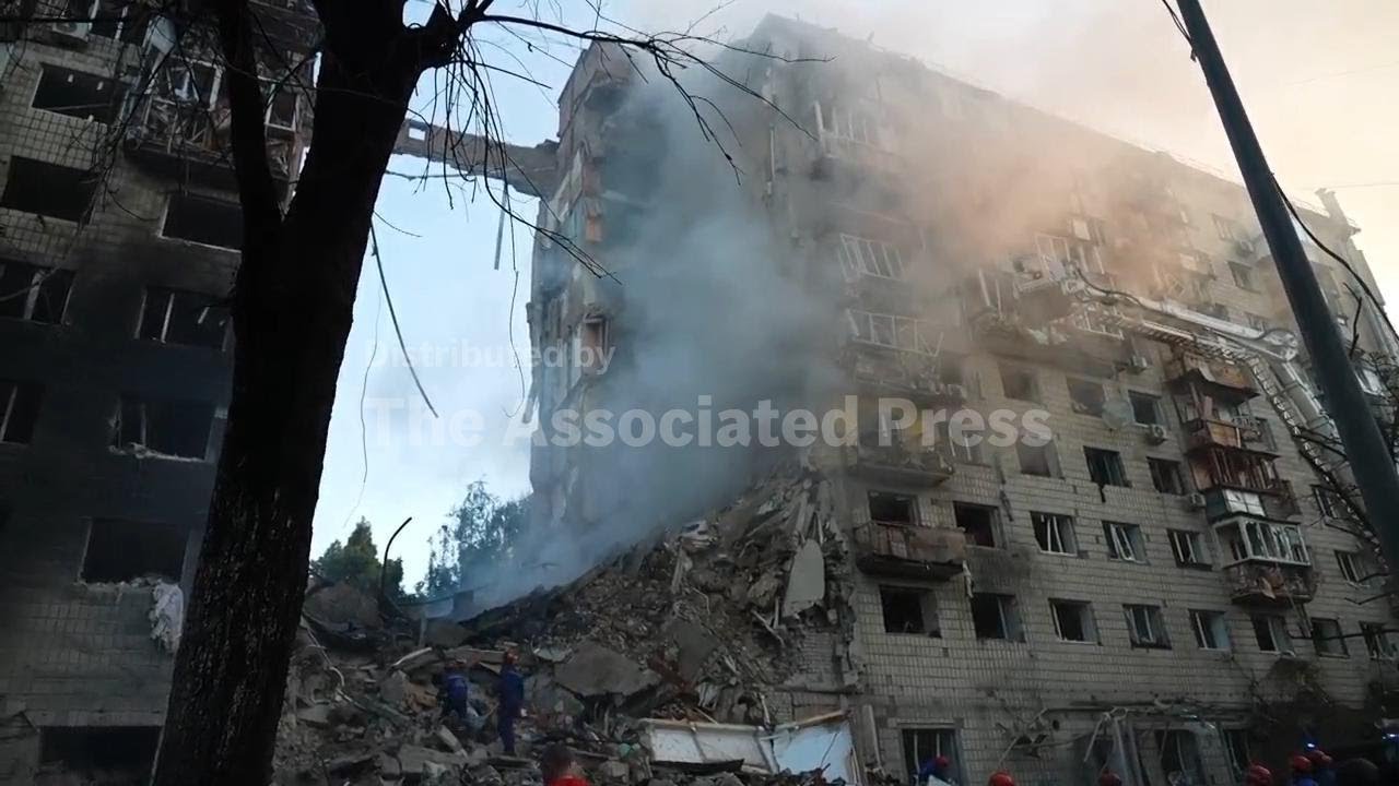 Scenes of devastation as residential buildings hit during deadly Russian attack on Ukraine capital