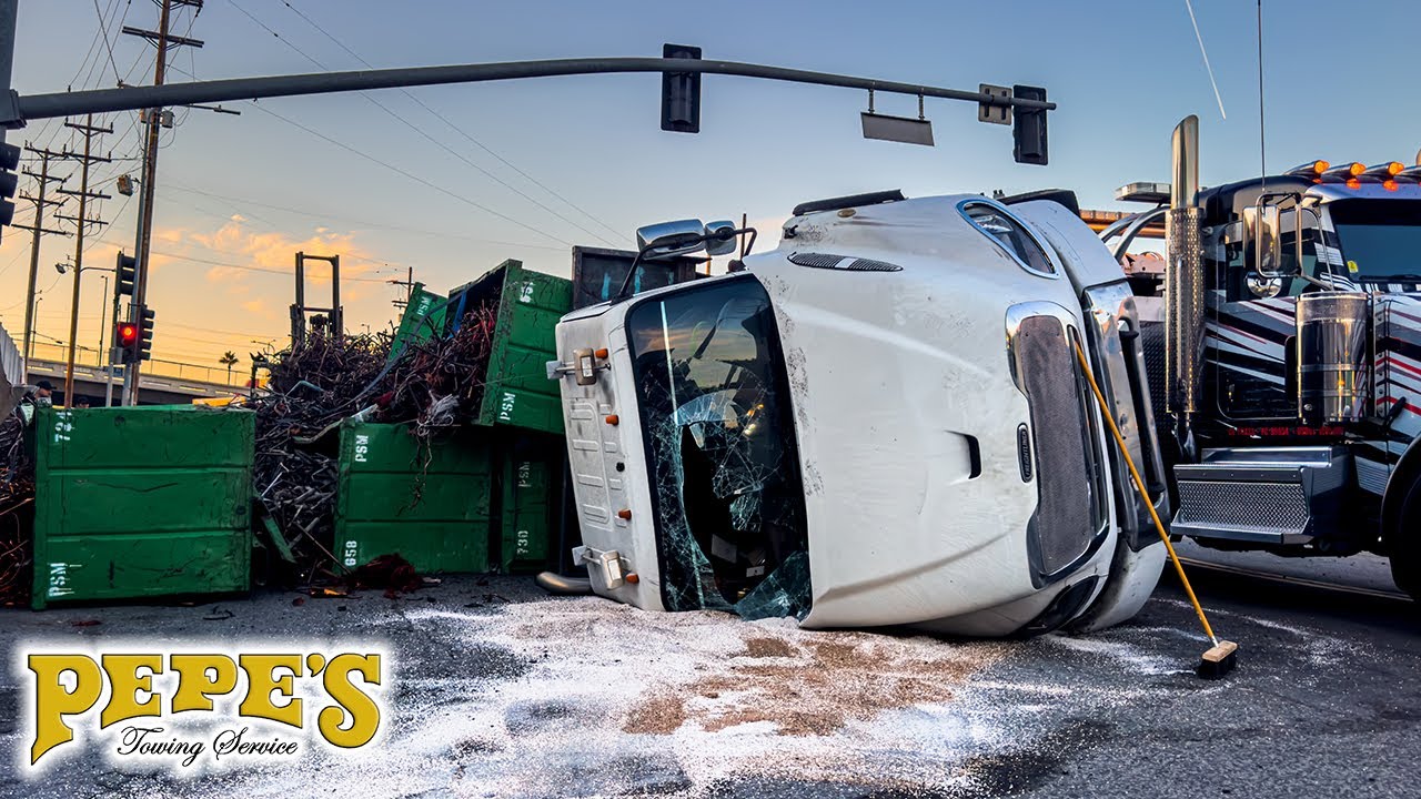 Scrap metal truck rollover = BIG MESS!