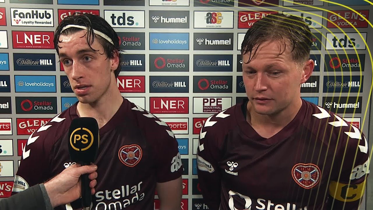 Frankie Kent and Tómas Magnússon react after Hearts snatch Edinburgh Derby win