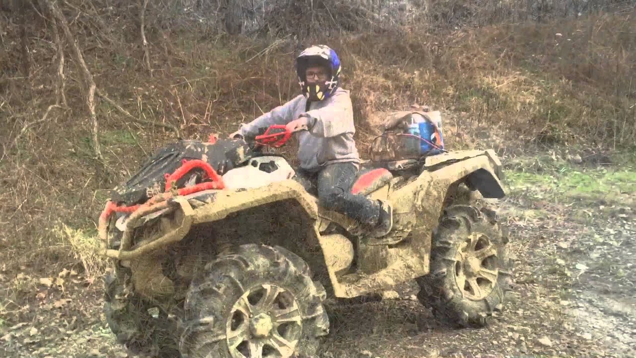 2016 can am XMR 1000R with yoshimura slip on playing in the mud