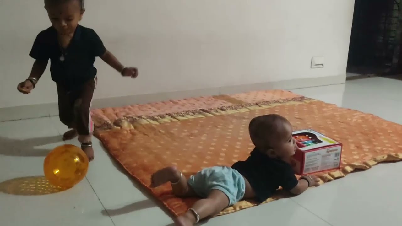 Prabhuraj enjoy with ball and xylophone
