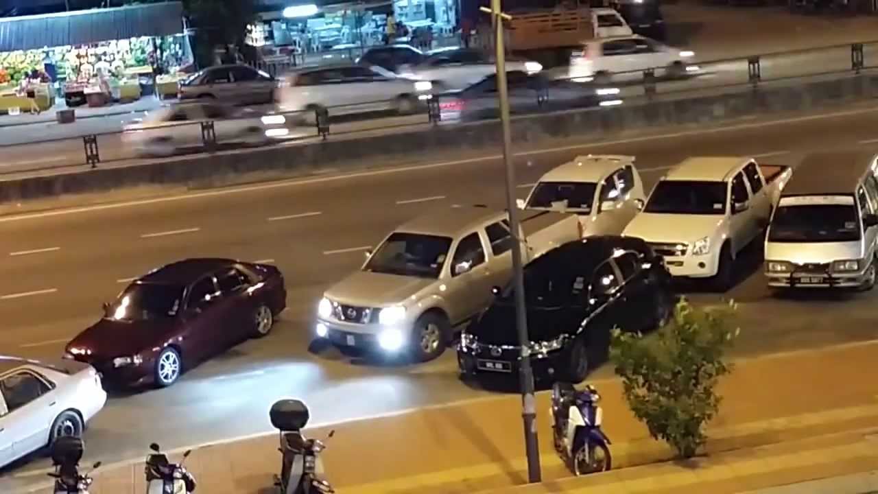 Pickup Truck Reverses Double Parked Car