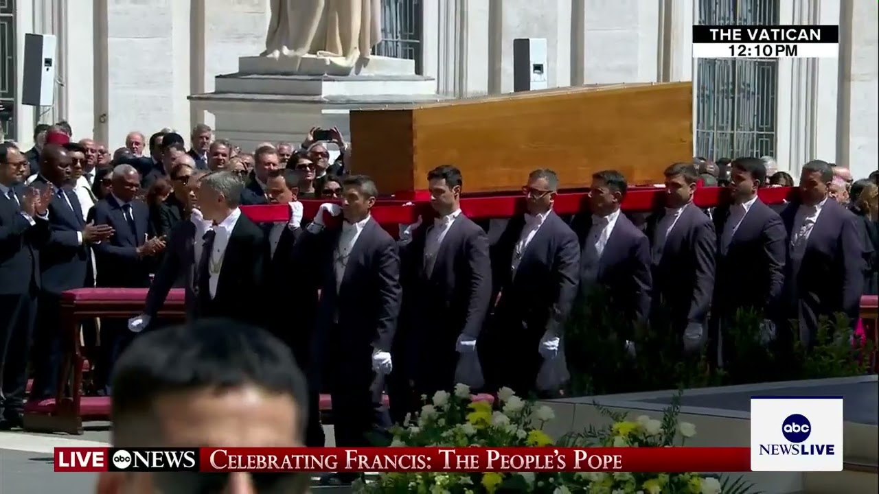 Papal gentlemen carry Pope Francis' casket out of St. Peter's Square