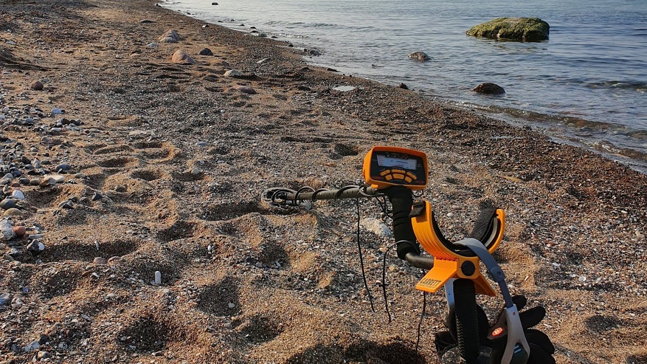 Euros beim Sondeln am Strand