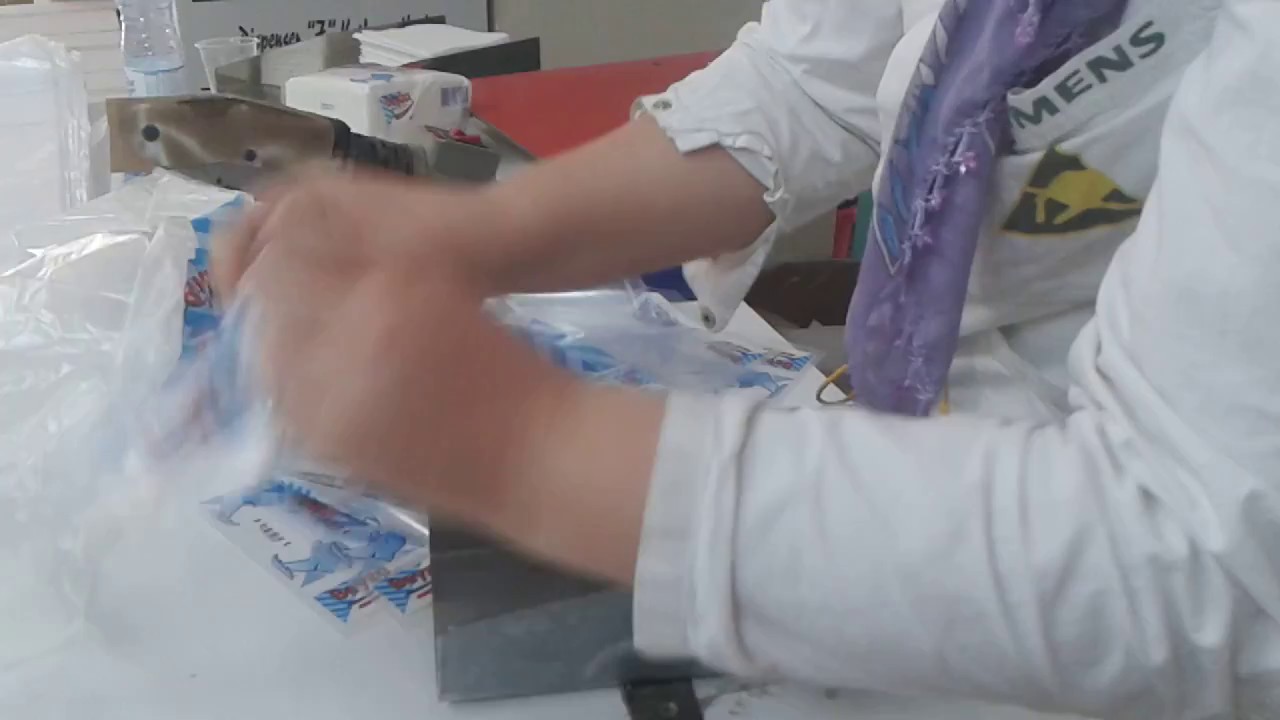 Aparat de ambalat servetele patrate