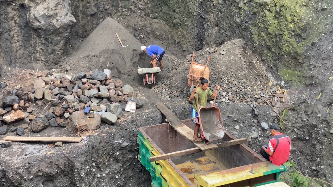 Today, miners are digging and loading sand into trucks. 