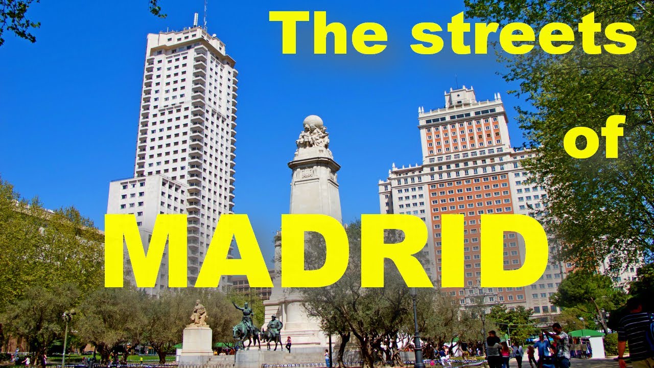 ИСПАНИЯ: МАДРИД.  Площадь Испании (Plaza de España) и улицы Мадрида в пасмурный день.