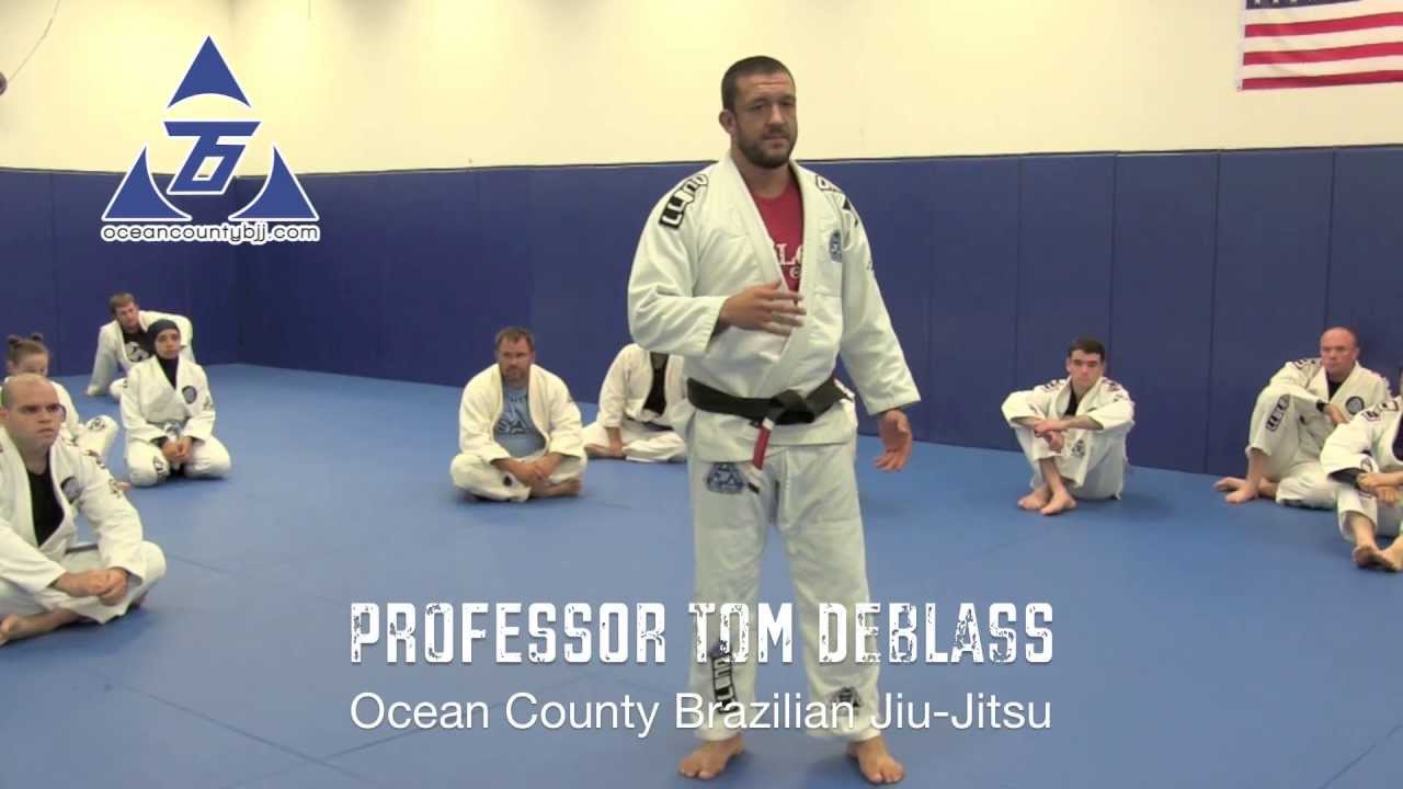 Rolling Armbar from Half Guard with Professor Tom DeBlass of OCBJJ - Seminar at SJBJJ - Nogi Bear™