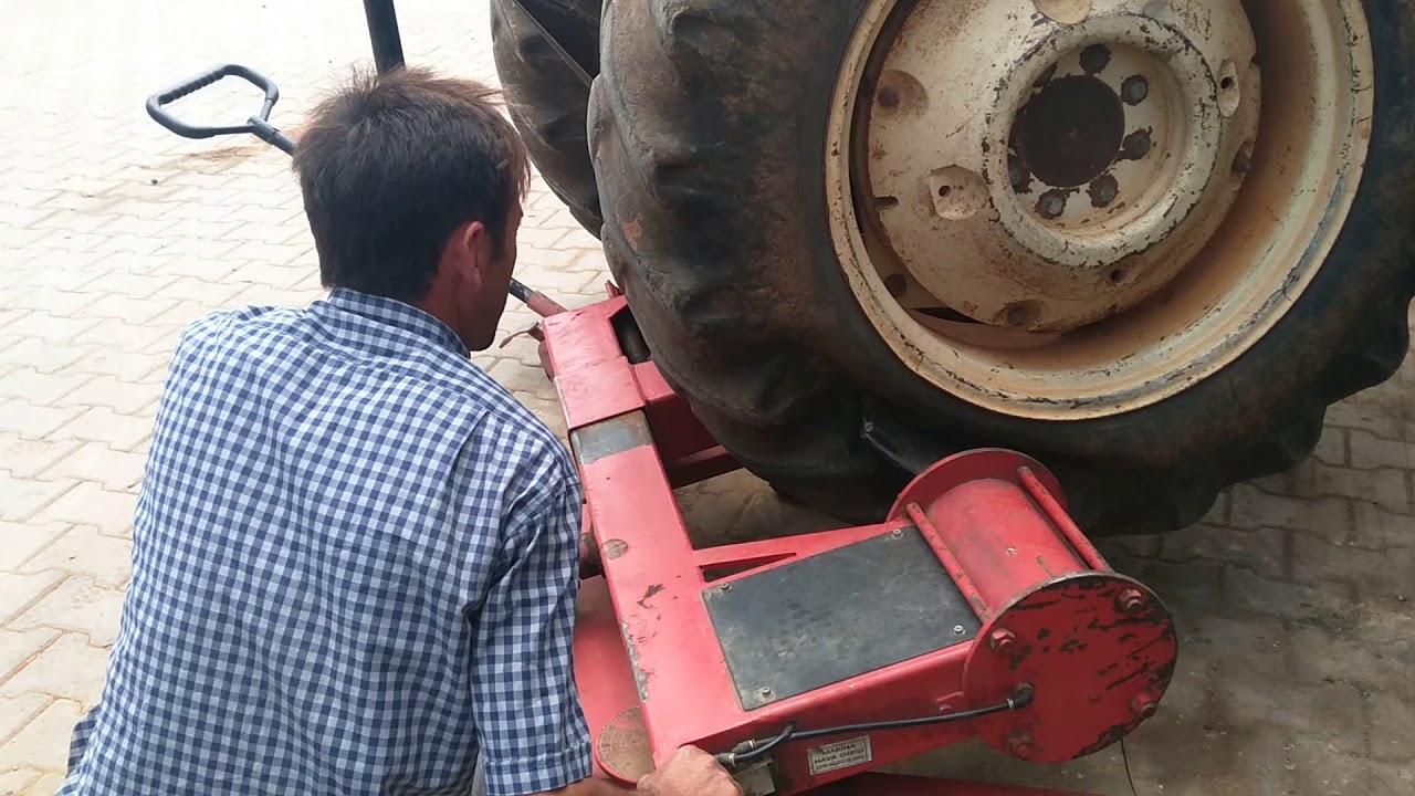 TRAKTÖR LASTİK SÖKME.    HAVALI MAKINA İLE