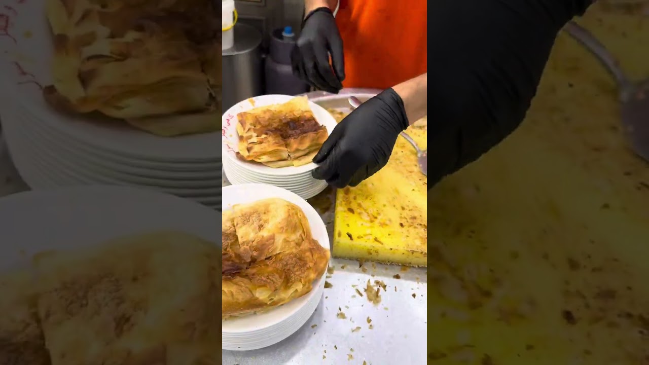 Iraqi Famous Breakfast Traditionally Served كاهي و قيمر رسول at street of Souq Sadriya in baghdad