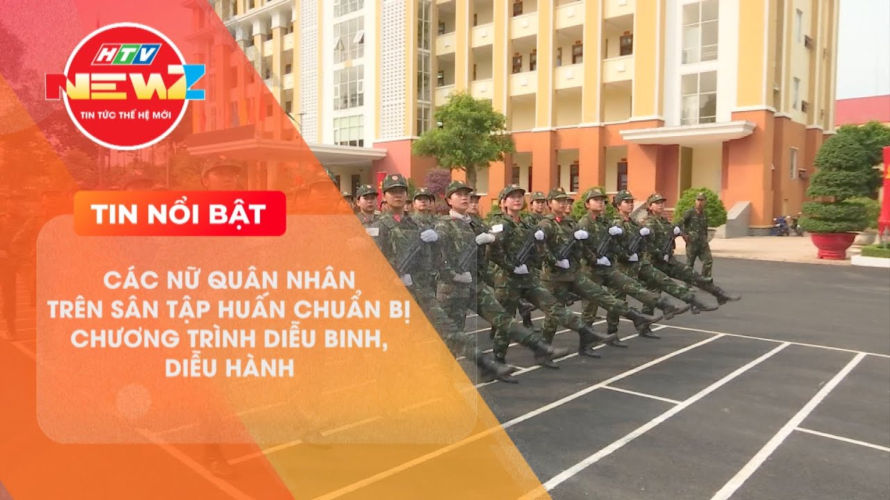 NỮ QUÂN NHÂN TRÊN SÂN TẬP CHUẨN BỊ CHƯƠNG TRÌNH DIỄU BINH, DIỄU HÀNH