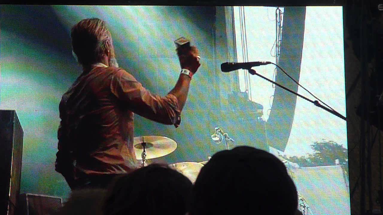 Triggerfinger's Mario Goossens shows off his drumming skills @ Suikerrock festival 2012