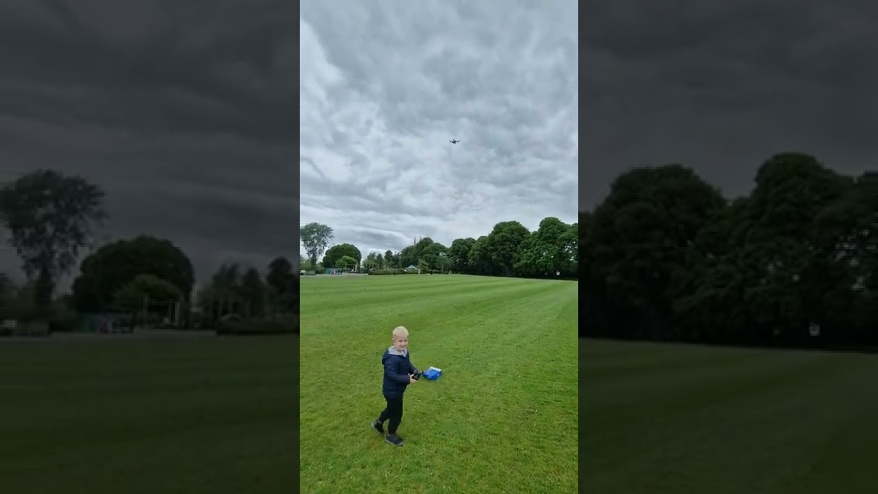 Samuel trying to fly drone at Abbey Park,  PERSHORE