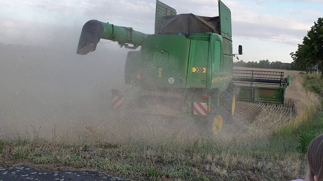 Mähdrescher John Deere S690i Trio mit Abbunkern