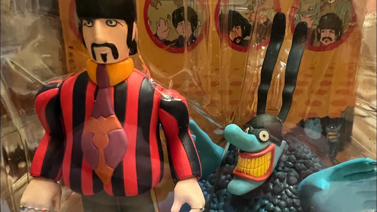 McFarlane Toys 1999 (from the Beatles movie “ Yellow Submarine “ ) Ringo Starr & Blue Meanie .