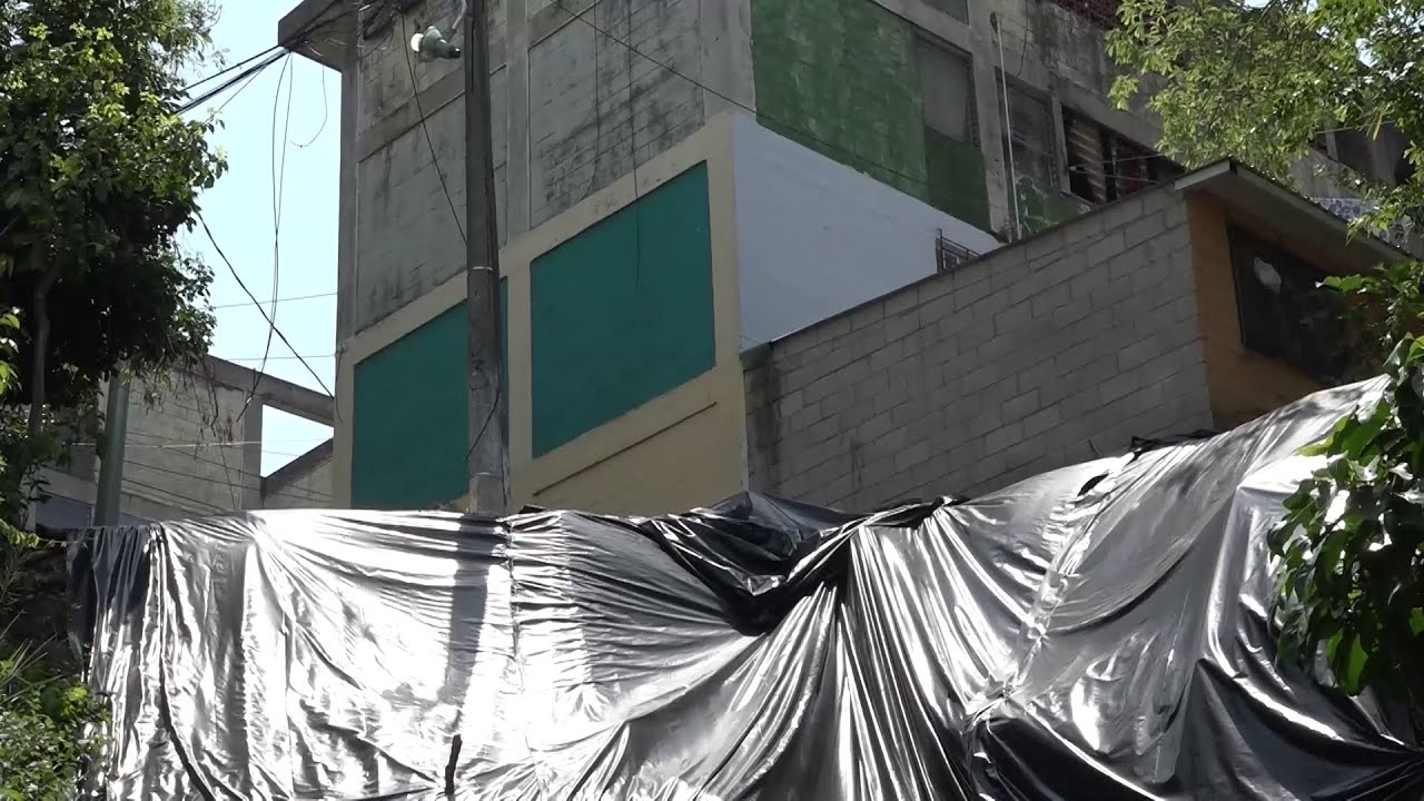 Habitantes de edificio 20 en colonia Zacamil denuncian derrumbe de murro