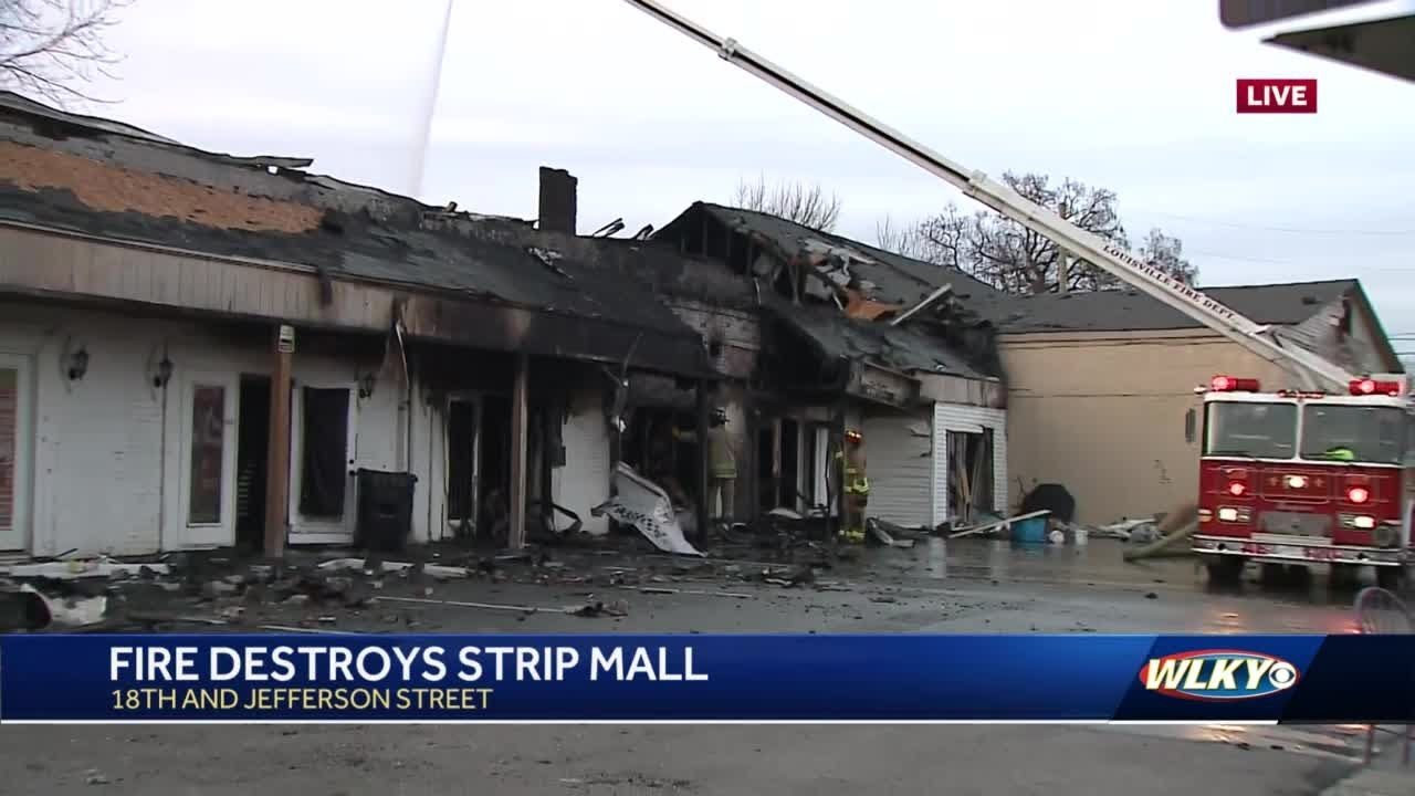 Small strip mall destroyed by fire in Russell neighborhood