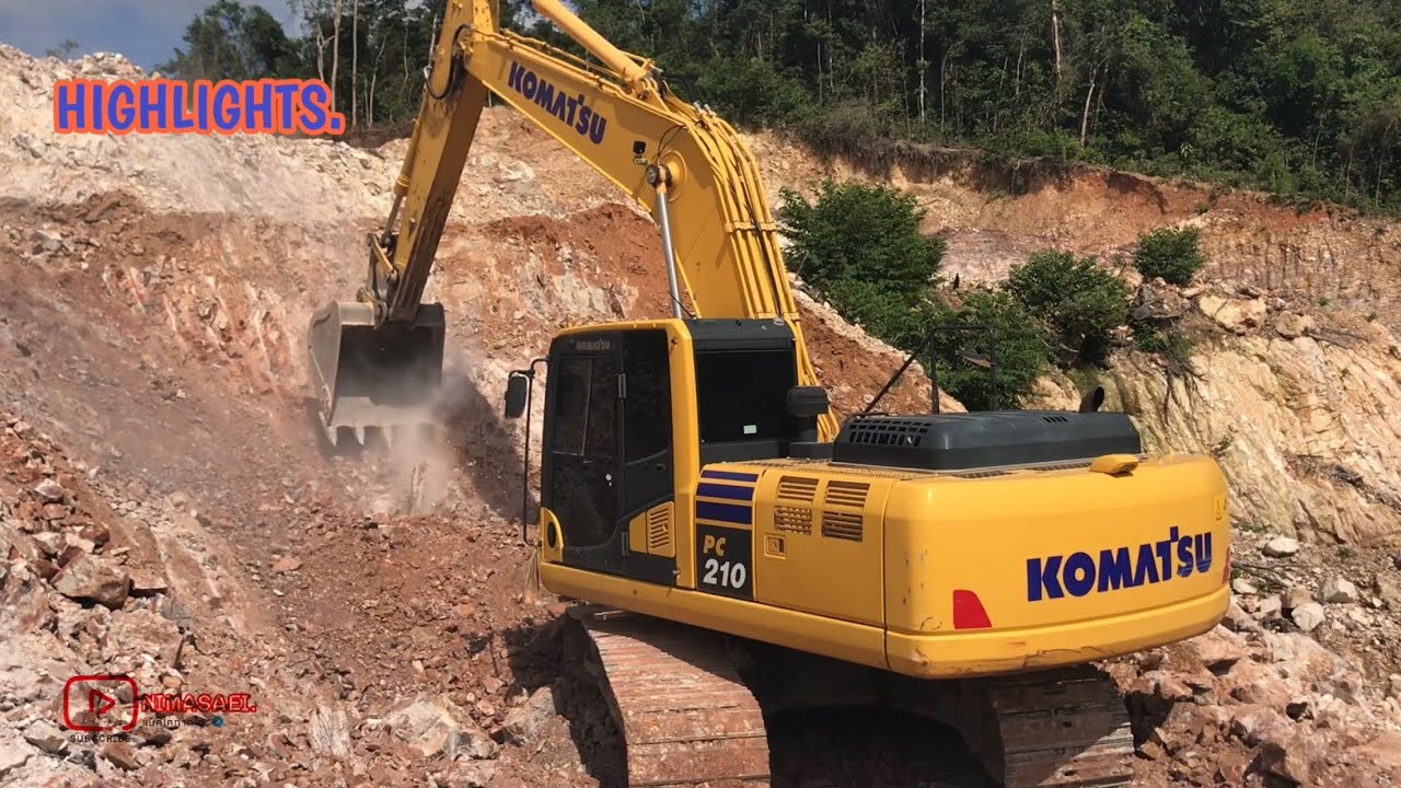 Прошло уже немало времени, но этот Komatsu PC210-10M0 по-прежнему великолепен. Двигатель ревет, и...