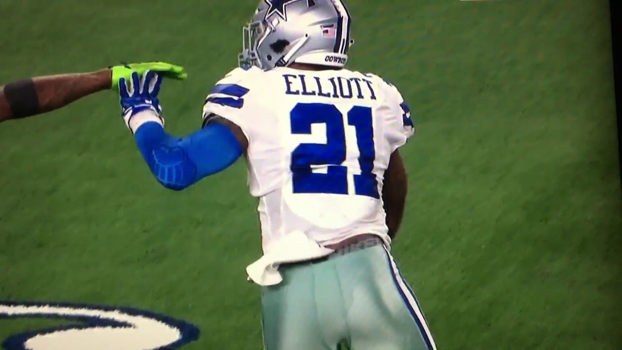 Ezekiel Elliot stiff arms Shaq Griffin