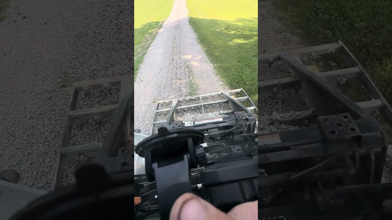 Grading a 1/8 mile driveway with the rake-n-ator and the new Bobcat T870.
