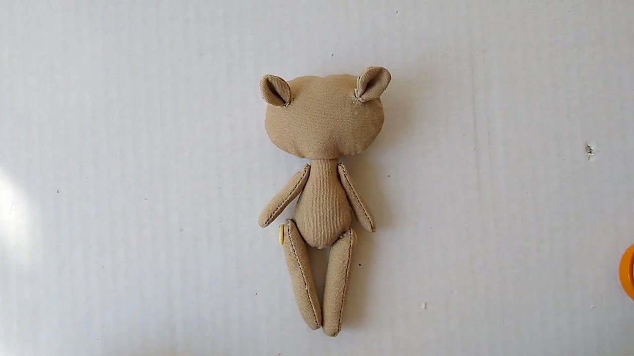 How we make a button jointed  cloth dolls.