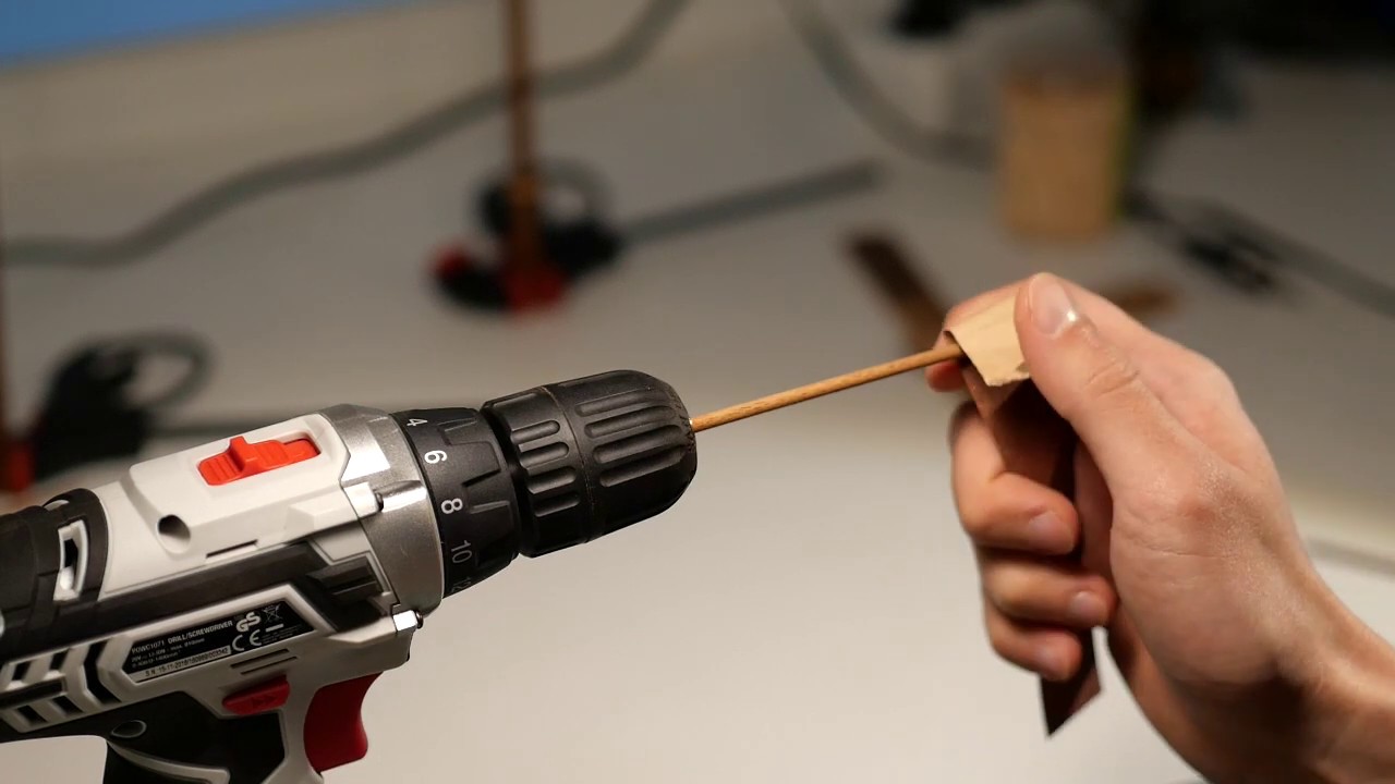 sanding masts (yards) with hand drill (electrical screwdriver) for wooden ship models