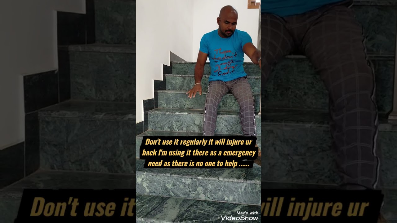 Paraplegic gets down from stairs by his own.............