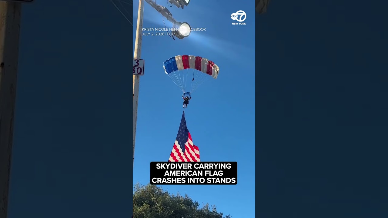 Skydiver carrying American flag crashes into stands