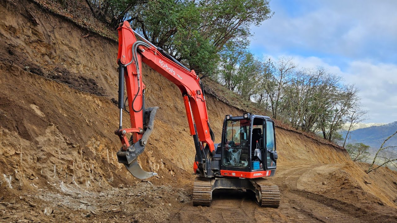 Werk Brau ripper and run away stump with the Kubota KX 080 4 excavator