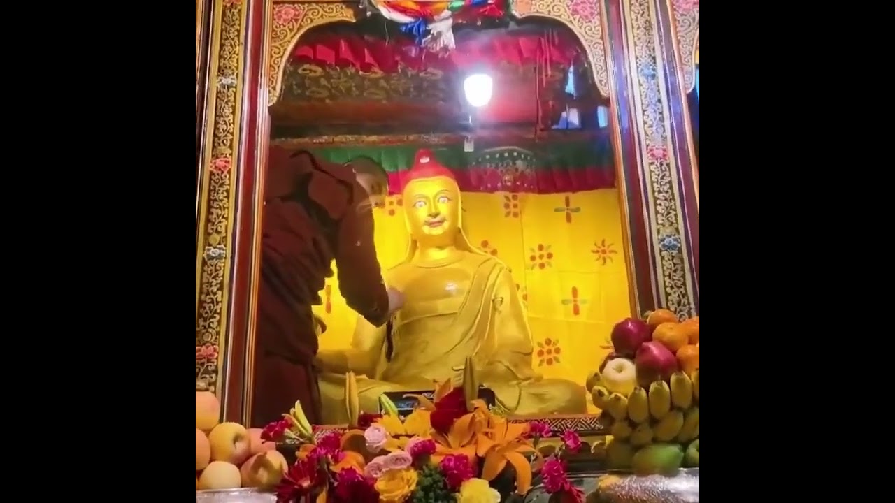 Sacred Ritual: Buddha Statue Cleansing Ceremony in Tibet