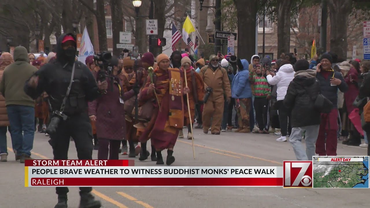 Hundreds in Raleigh watch peace walk by Buddhist Monks