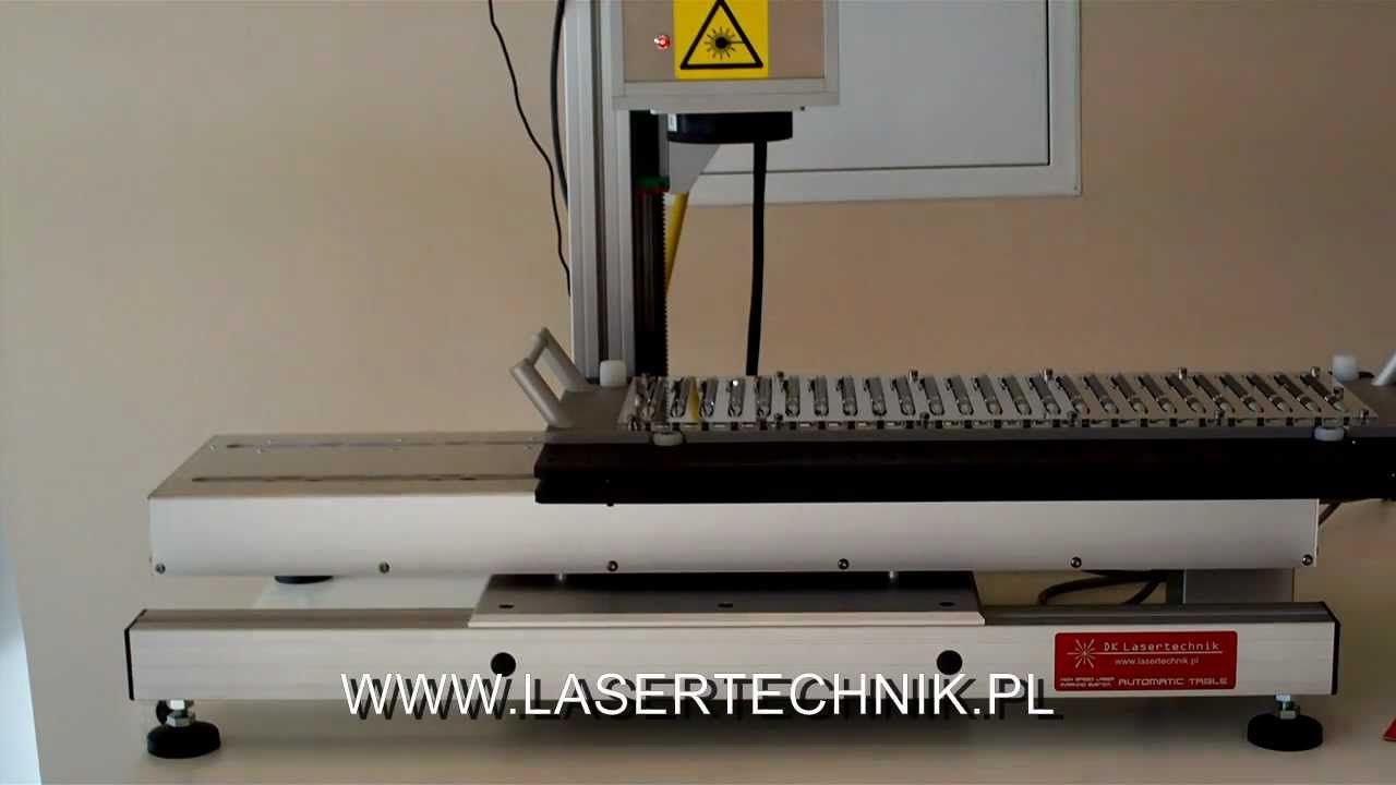 Laserowe znakowanie, grawerowanie długopisów i gadżetów, automatyczny podajnik, DK Lasertechnik