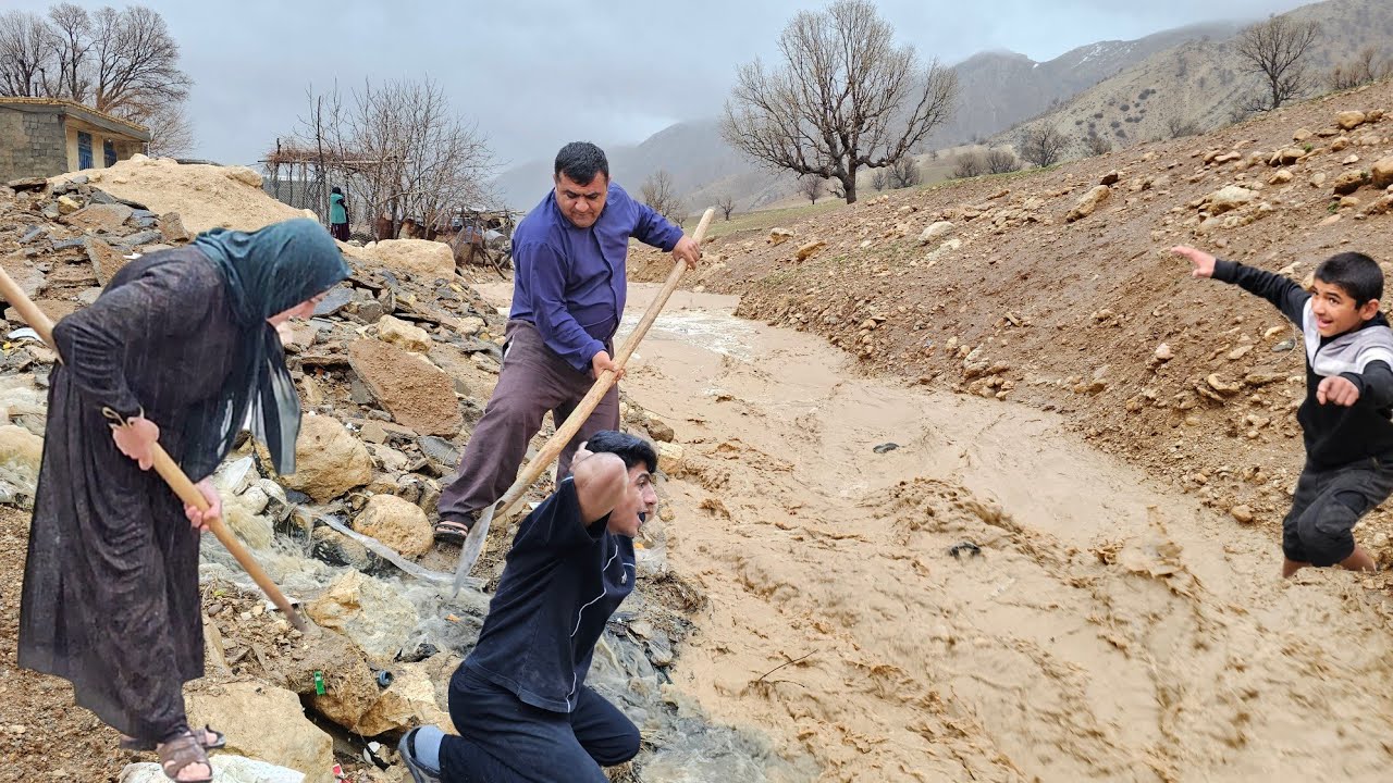 Hussein's family returns to flooded village