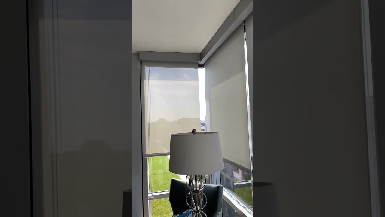 Lutron Motorized Roller Shades at a Corner Window