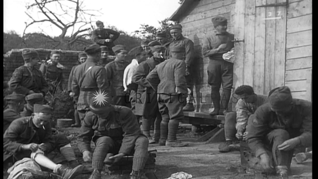 US 27th Division soldiers bathe behind the lines. Soldiers march at 'Ecole de Pre...HD Stock Footage