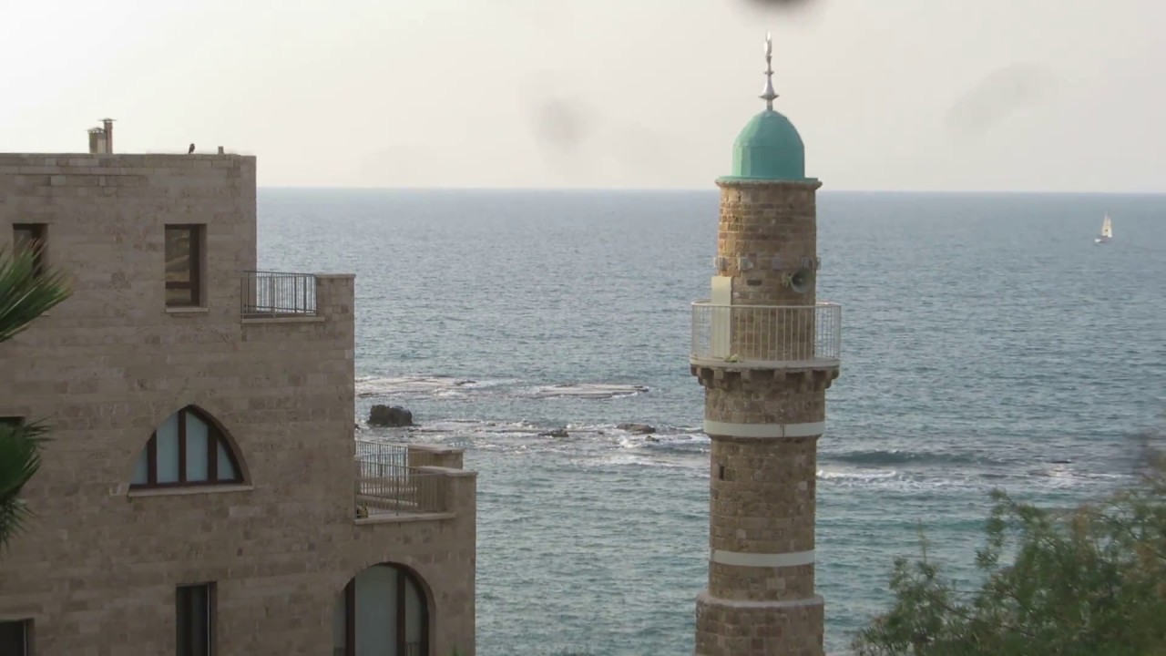 Old Jaffa, Israel - a view of the Mediterranean, Andromeda Rock and the skyline of Tel Aviv