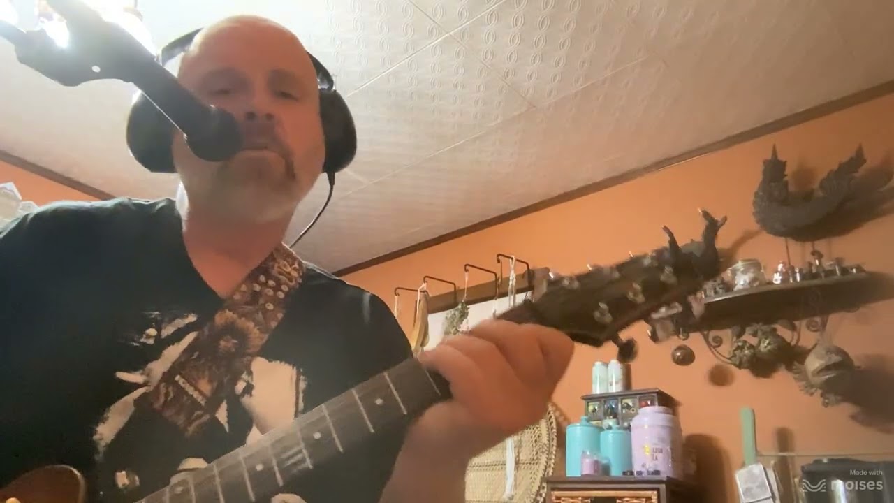 One written by U2 performed by Jeff Luttrell