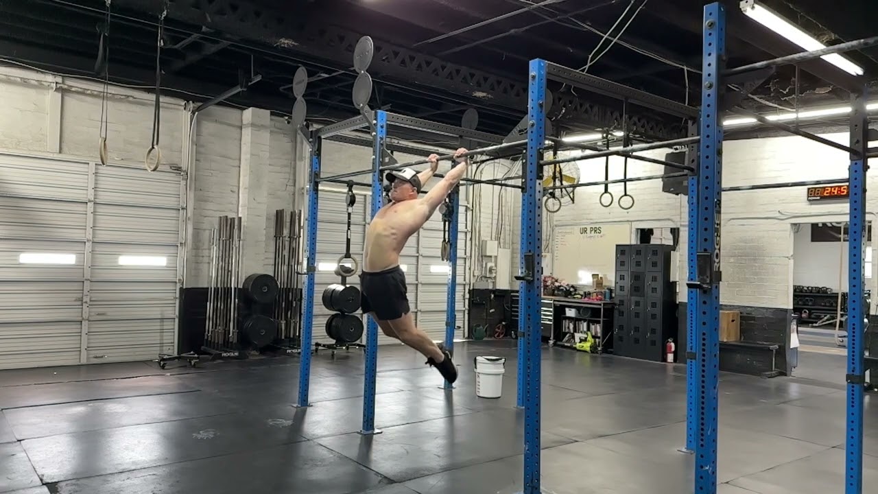 SLOW MO KIPPING BAR MUSCLE UP