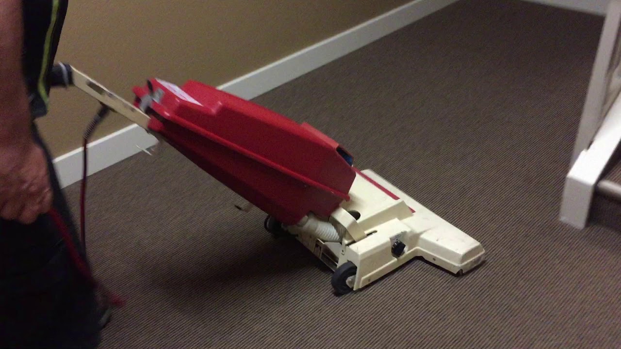 Oxy-Dry vacuuming condo hall with Advance Carpet twin wide area vacuum.