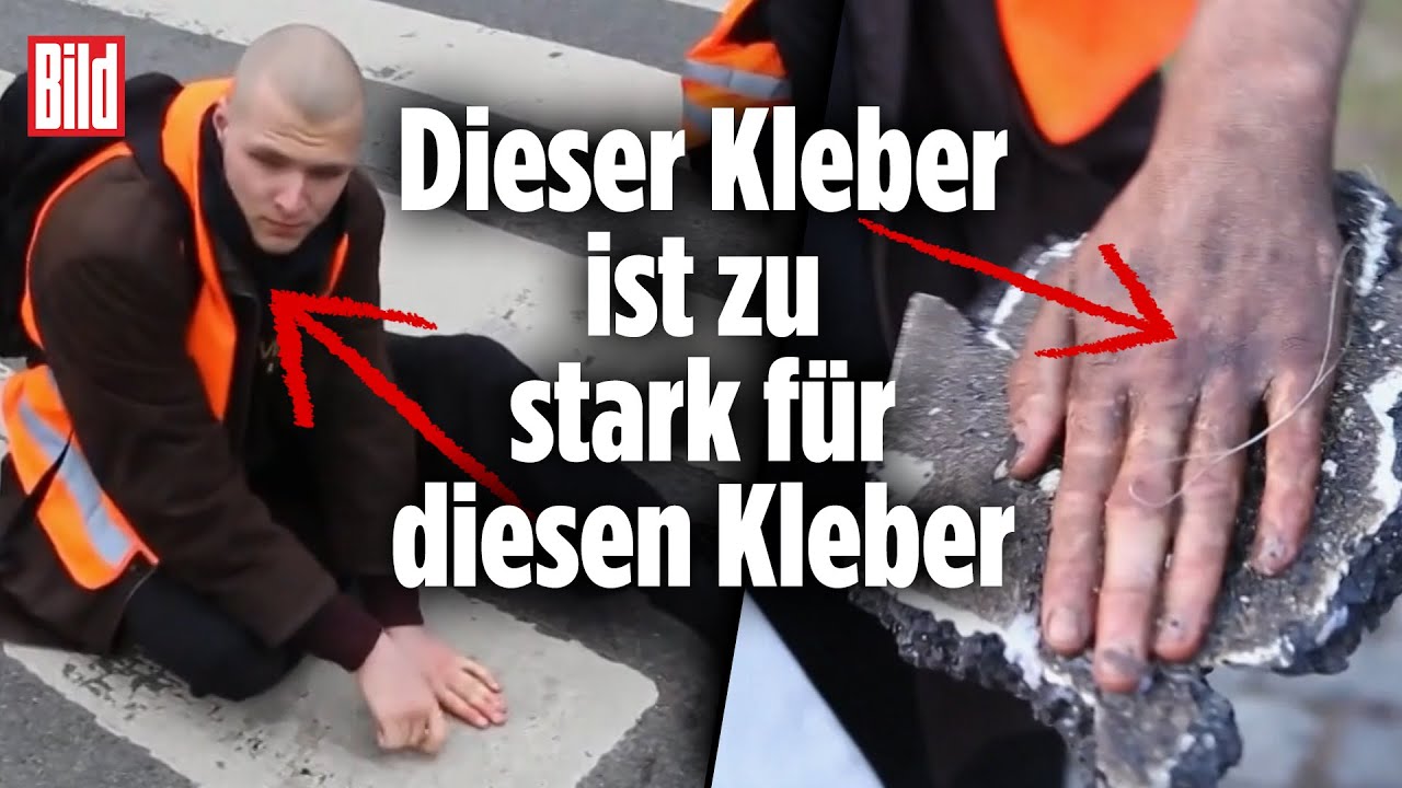 Super-Kleber zu stark: Klima-Kleber hängt Stück Straße an der Hand