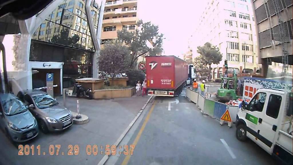 Trucking through the narrow streets and tunnels of Monaco. Dash-cam video.