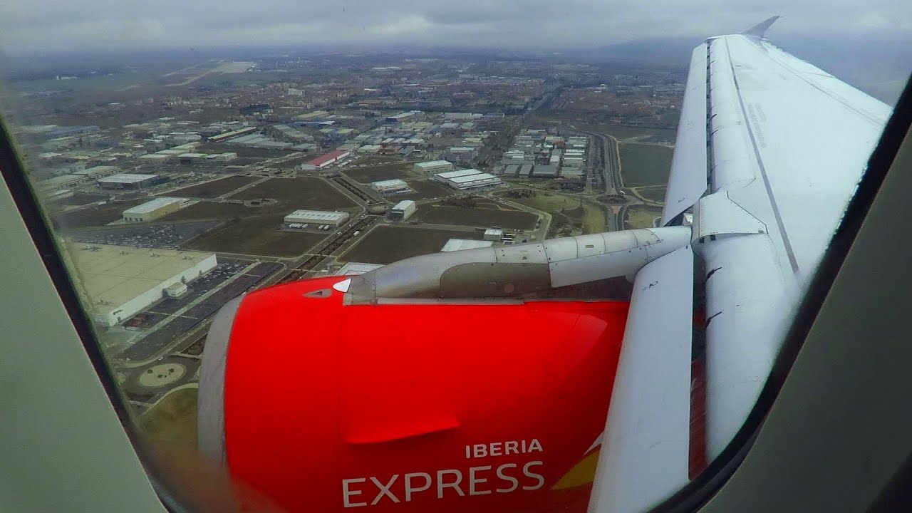 Iberia Express Airbus A320 ONBOARD Landing at Cloudy Madrid Barajas Airport MAD