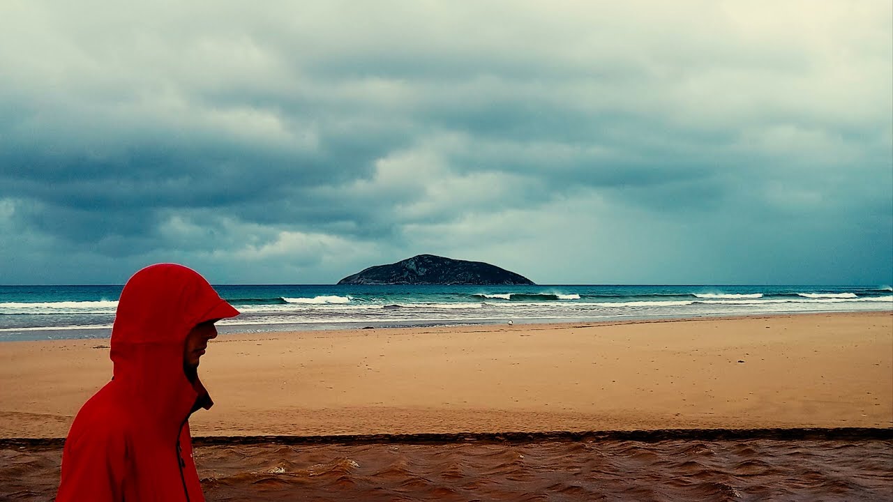 Raincoat At The Beach