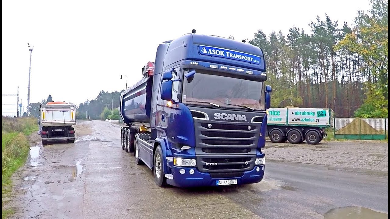 Scania and Volvo trucks in sandpit - Asok Transport