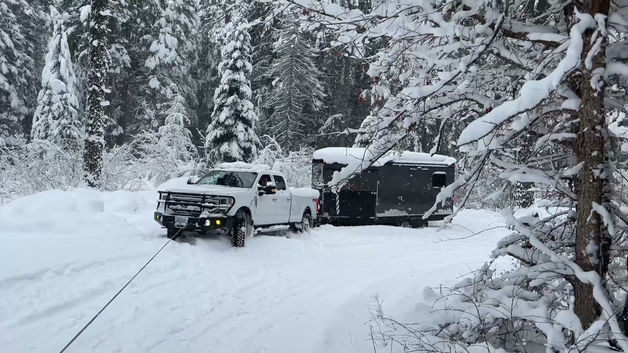 Winching Ford F-350 out of snow bank